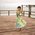 Priya Lime Parrot Cotton Umbrella Maxi Dress – front view
